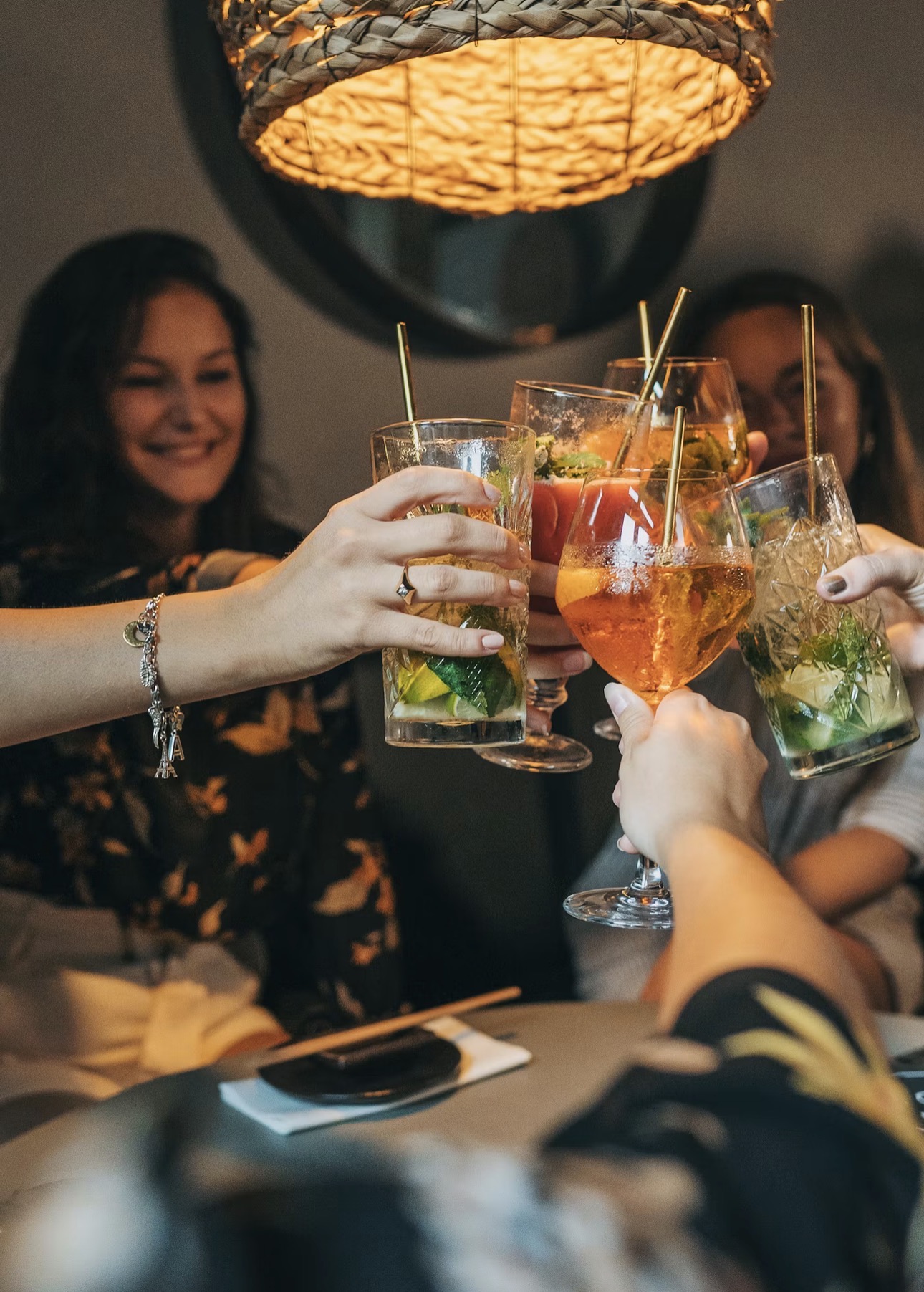 Friends raising cocktails